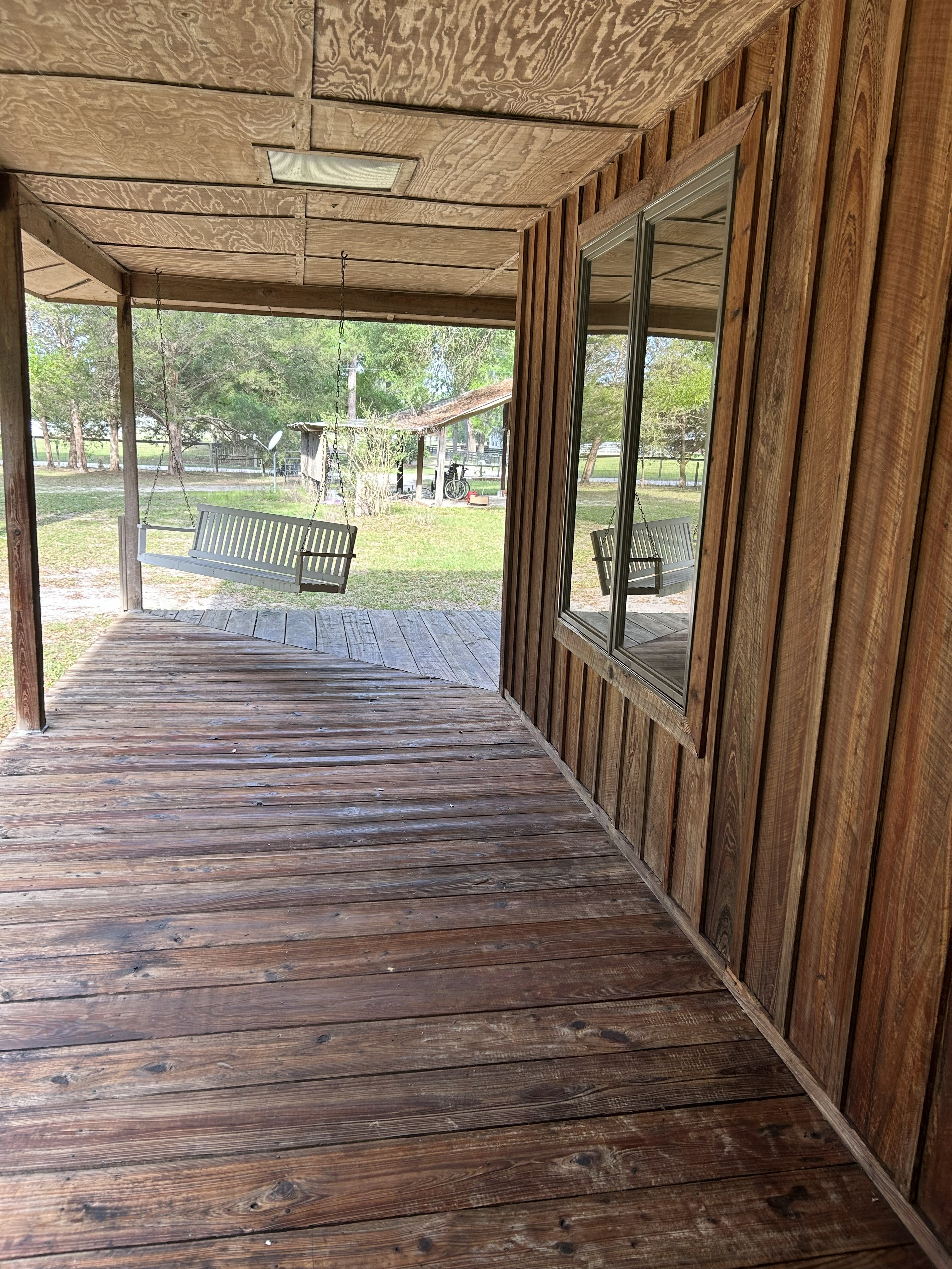 Porch with swing and yard view