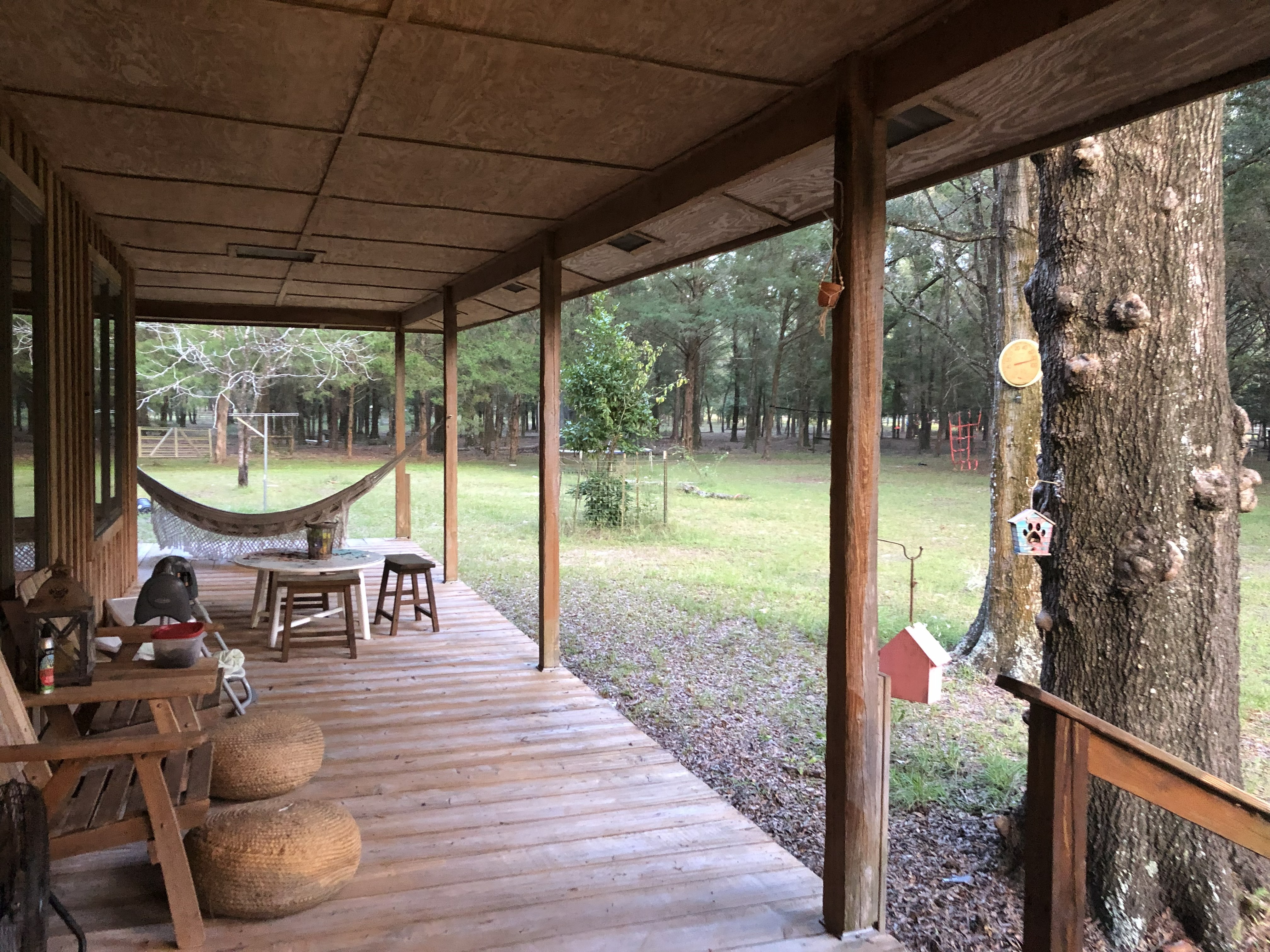 Open porch with hammock and yard view