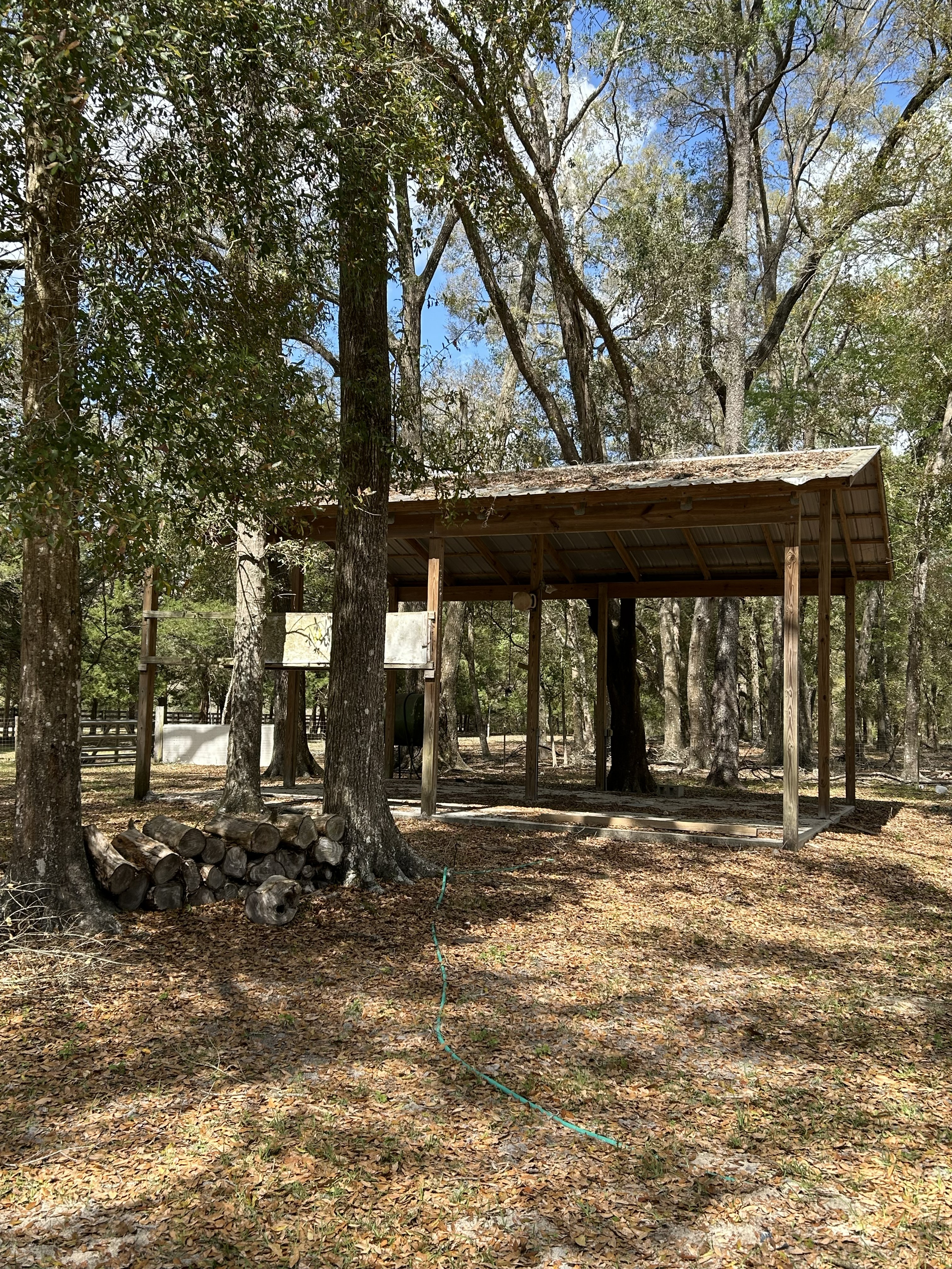 Pole barn with firewood storage