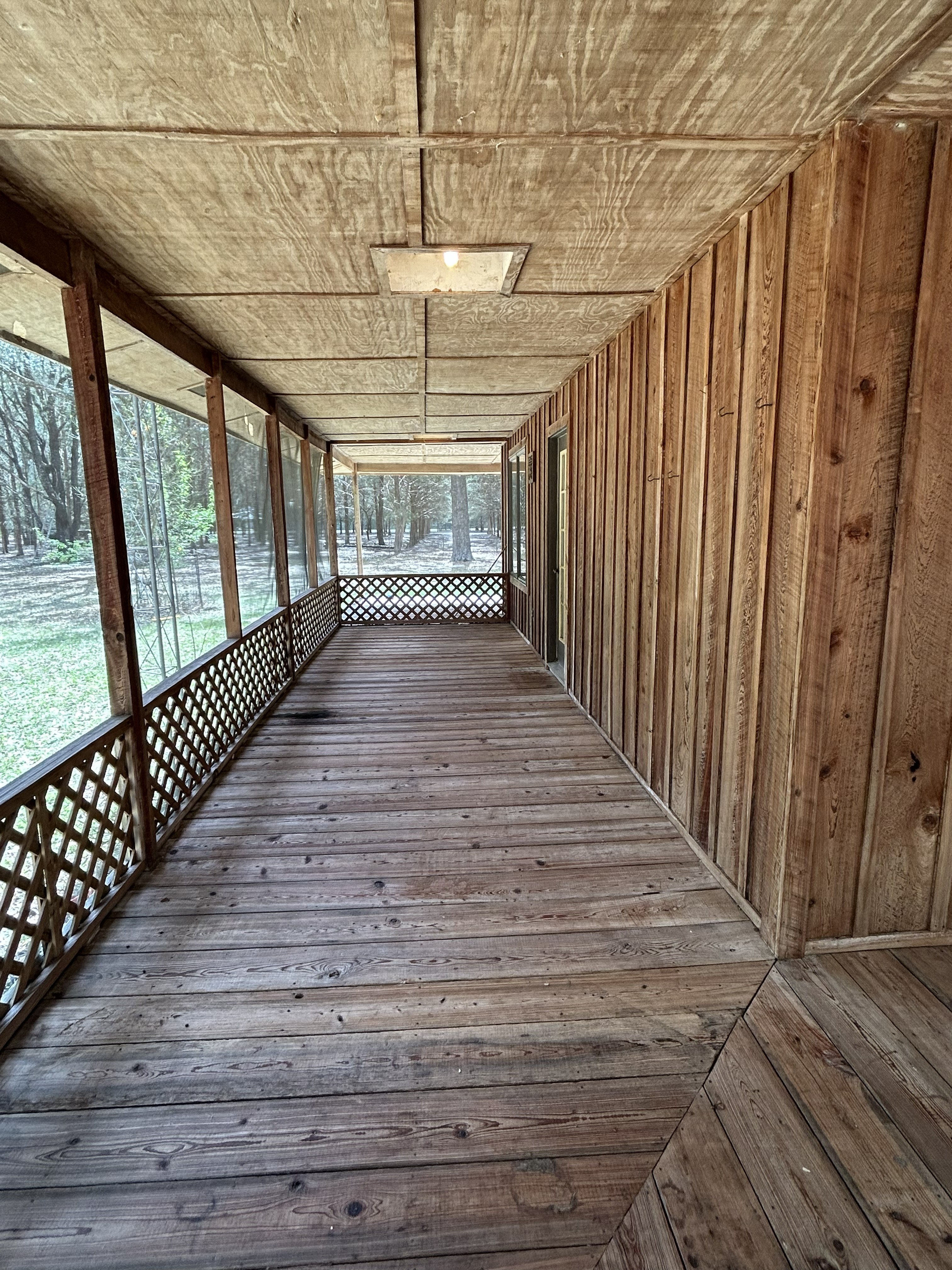Screened wrap-around porch